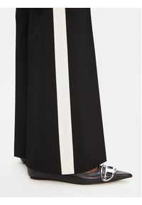 Hugo - HUGO Spodnie materiałowe Hizana 50544753 Czarny Flare Fit. Kolor: czarny. Materiał: syntetyk