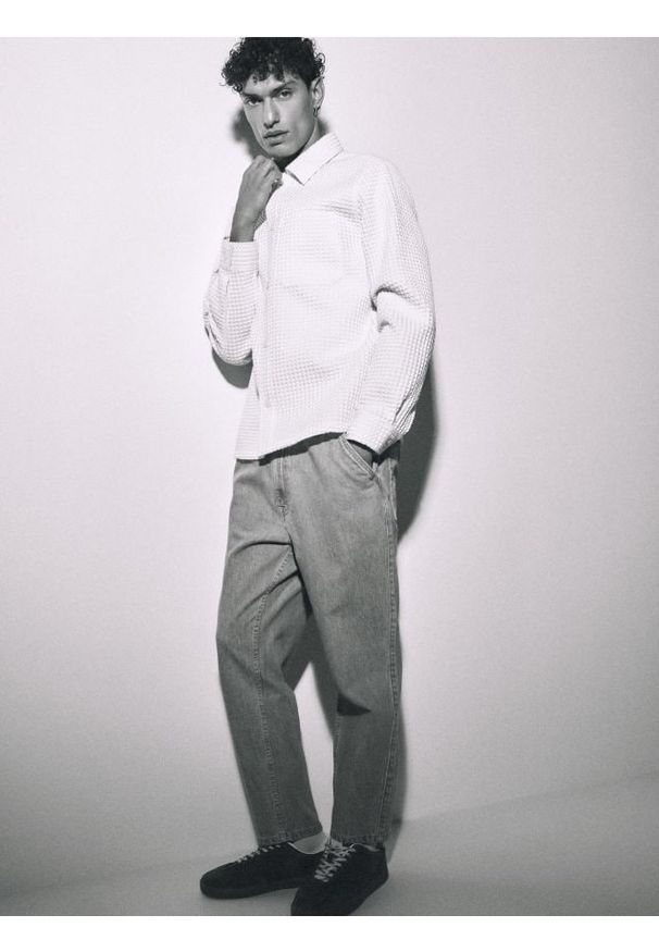 Reserved - Jeansy carrot fit - niebieski. Kolor: niebieski