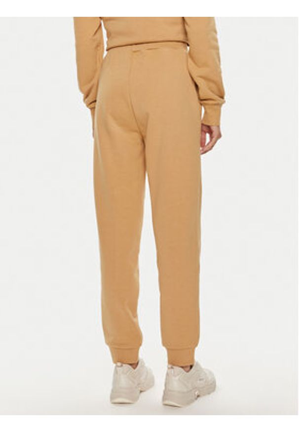 Calvin Klein Spodnie dresowe Nano Logo K20K207214 Beżowy Relaxed Fit. Kolor: beżowy. Materiał: bawełna