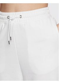 Tommy Jeans Spodnie dresowe Archive DW0DW14994 Biały Relaxed Fit. Kolor: biały. Materiał: syntetyk