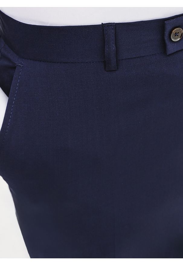 Pako Lorente - PAKO LORENTE – Wełniane spodnie garniturowe w kolorze granatowym. Okazja: na spotkanie biznesowe. Kolor: niebieski. Materiał: wełna. Styl: elegancki, biznesowy