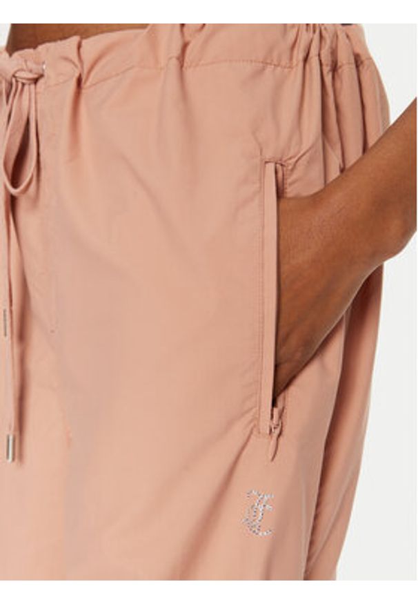 Juicy Couture Spodnie dresowe Ayla JCWBJ24306 Beżowy Loose Fit. Kolor: beżowy. Materiał: syntetyk