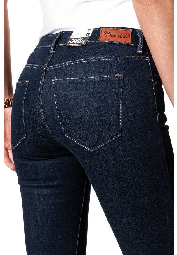 Wrangler - WRANGLER HIGH SKINNY COSY TOUCH W27HRL21N 112128115. Stan: podwyższony. Wzór: jednolity
