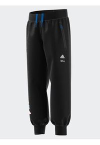 Adidas - adidas Spodnie dresowe IB4843 Czarny Loose Fit. Kolor: czarny. Materiał: bawełna #3