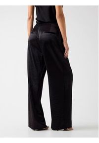 Guess Spodnie materiałowe 180020 Czarny Slim Fit. Kolor: czarny. Materiał: materiał #4