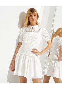 SELF PORTRAIT - Biała rozkloszowana sukienka mini. Kolor: biały. Materiał: koronka, bawełna. Typ sukienki: rozkloszowane. Długość: mini
