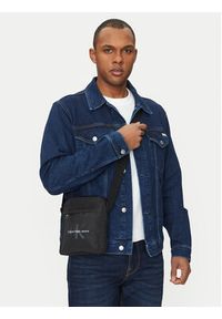 Calvin Klein Jeans Saszetka Sport Essentials Reporter 18 LV04G3000G Czarny. Kolor: czarny. Materiał: materiał #4