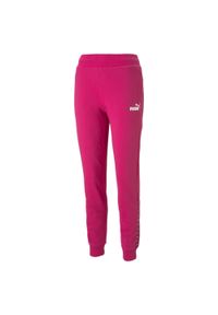 Spodnie damskie Puma Power Tape. Kolor: różowy. Materiał: bawełna, dresówka, materiał. Sport: fitness #1