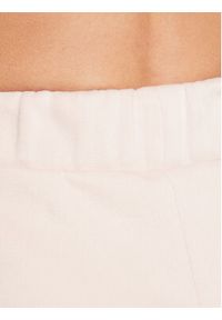 outhorn - Outhorn Spodnie dresowe TTROF053 Różowy Relaxed Fit. Kolor: różowy. Materiał: bawełna, dresówka #5
