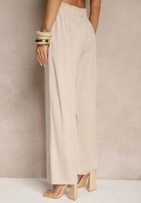 Renee - Beżowe Szerokie Spodnie z Wiskozy Ozdobione Wiązaniem Toleassa. Okazja: na co dzień. Kolor: beżowy. Materiał: wiskoza. Wzór: aplikacja. Styl: casual #2