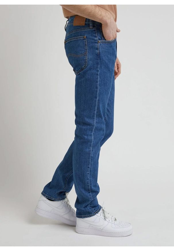 Lee - LEE DAREN ZIP FLY MĘSKIE SPODNIE JEANSOWE STONEAGE MID L707KND14 112338472