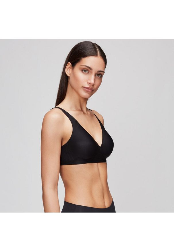 Intica - Biustonosz z głębokim dekoltem do codziennych stylizacji Jacquelin. Kolor: różowy. Materiał: materiał