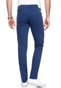 Wrangler - WRANGLER SPODNIE MĘSKIE CHINO BLUE DEPTHS W16LHB13Y. Materiał: materiał #6