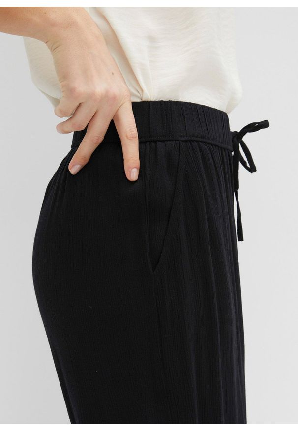 bonprix - Spodnie z gumką w talii, z wiskozy. Kolekcja: petite. Kolor: czarny. Materiał: wiskoza