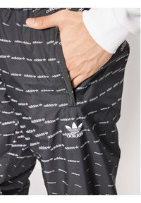 Adidas - adidas Spodnie dresowe Graphics Monogram H13484 Czarny Regular Fit. Kolor: czarny. Materiał: dresówka, syntetyk #3