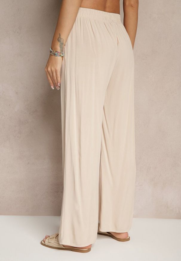 Renee - Beżowe Spodnie z Wiskozy High Waist o Szerokim Kroju Avelozi. Okazja: na co dzień. Stan: podwyższony. Kolor: beżowy. Materiał: wiskoza. Styl: casual, elegancki