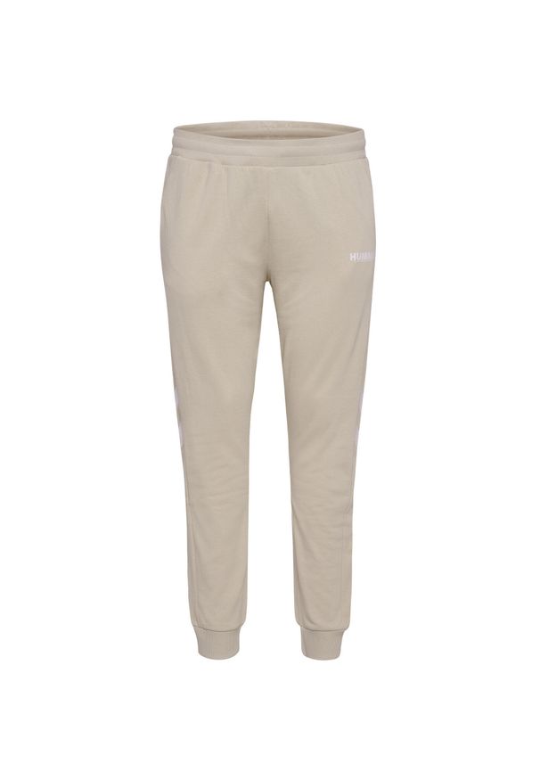 Damskie spodnie dresowe zwężane Hummel Legacy Plus. Kolor: szary. Materiał: dresówka. Sport: fitness