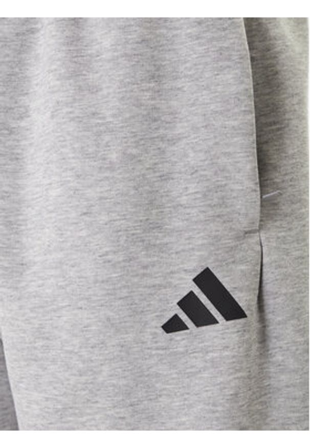 Adidas - adidas Spodnie dresowe Future Icons 3-Stripes JD4867 Szary Regular Fit. Kolor: szary. Materiał: bawełna