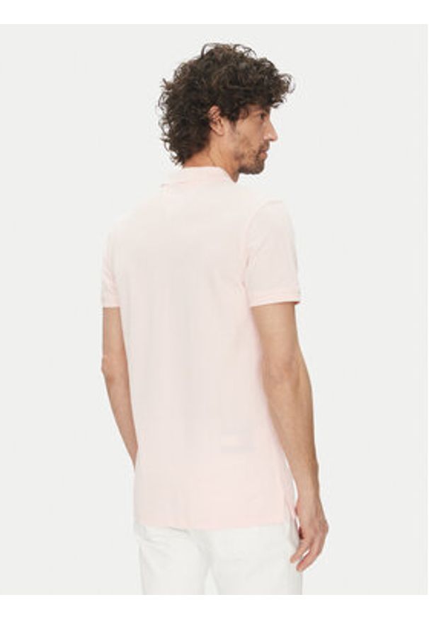 Tommy Jeans Polo DM0DM20676 Różowy Slim Fit. Typ kołnierza: polo. Kolor: różowy. Materiał: bawełna