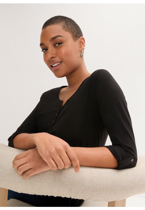 bonprix - Bluzka z plisą guzikową z czystej bawełny organicznej. Typ kołnierza: dekolt w serek. Kolor: czarny. Materiał: bawełna. Długość rękawa: długi rękaw. Długość: długie