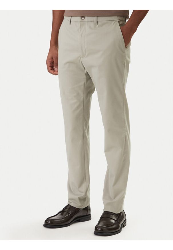 Calvin Klein Chinosy LV04LD613G Beżowy Slim Fit. Kolor: beżowy. Materiał: bawełna