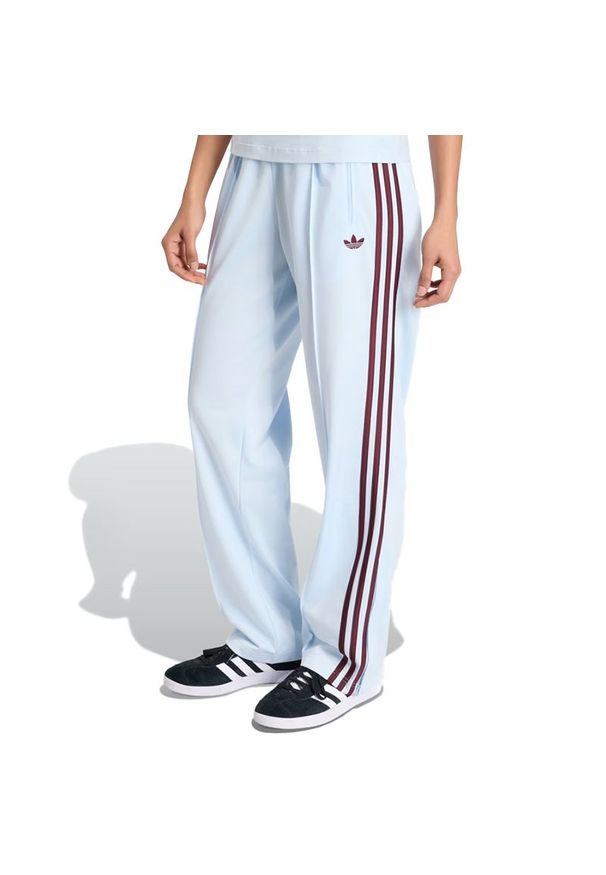 Adidas - Spodnie damskie adidas Originals Firebird Classic KC6561 - niebieskie. Kolor: niebieski. Materiał: materiał, tkanina, dresówka, poliester. Wzór: paski, aplikacja. Sezon: lato