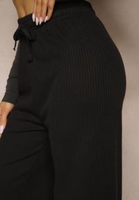 Renee - Czarne Spodnie o Szerokim Kroju High Waist Savianne. Okazja: na co dzień. Stan: podwyższony. Kolor: czarny. Sezon: wiosna. Styl: casual
