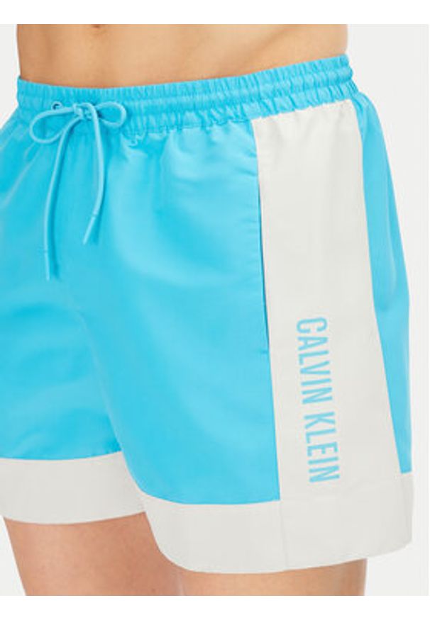 Calvin Klein Swimwear Szorty kąpielowe KM0KM01095 Niebieski Regular Fit. Kolor: niebieski. Materiał: syntetyk