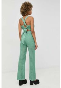 Guess spodnie damskie kolor zielony szerokie high waist. Stan: podwyższony. Kolor: zielony. Materiał: materiał #3