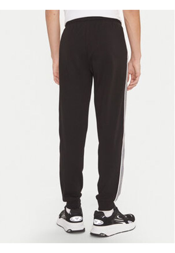 EA7 Emporio Armani Spodnie dresowe 6DPP69 PJ9FZ 1200 Czarny Regular Fit. Kolor: czarny. Materiał: bawełna