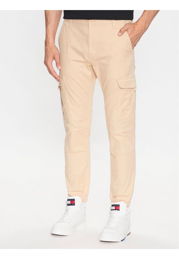 Tommy Jeans Joggery Ethan DM0DM15793 Beżowy Relaxed Fit. Kolor: beżowy. Materiał: bawełna