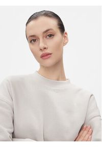 Calvin Klein Bluza Metallic Micro Logo Sweatshirt K20K206961 Beżowy Regular Fit. Kolor: beżowy. Materiał: bawełna, syntetyk