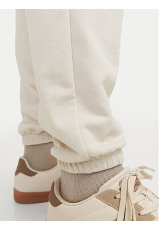 Jack & Jones Spodnie dresowe Morgan 12257964 Beżowy Regular Fit. Kolor: beżowy. Materiał: bawełna, syntetyk