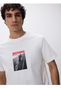 Reserved - T-shirt comfort z nadrukiem - złamana biel. Materiał: dzianina, bawełna. Wzór: nadruk #1