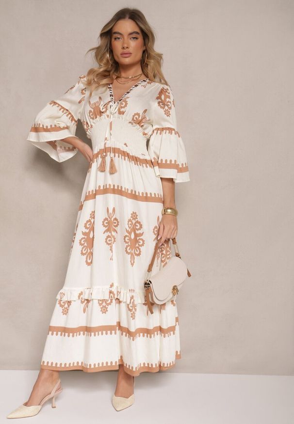 Renee - Beżowa Boho Sukienka z Wiskozą z Szeroką Gumką w Talii w Etniczny Wzór Efalios. Okazja: na co dzień, na spacer. Typ kołnierza: dekolt w serek. Kolor: beżowy. Materiał: wiskoza. Typ sukienki: proste. Styl: boho