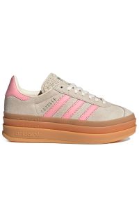 Adidas - Buty młodzieżowe adidas Originals Gazelle Bold J JQ7409 - beżowe. Okazja: na co dzień. Zapięcie: pasek. Kolor: beżowy. Materiał: zamsz, syntetyk, guma, skóra. Szerokość cholewki: normalna. Wzór: aplikacja, paski. Obcas: na platformie. Model: Adidas Gazelle #1