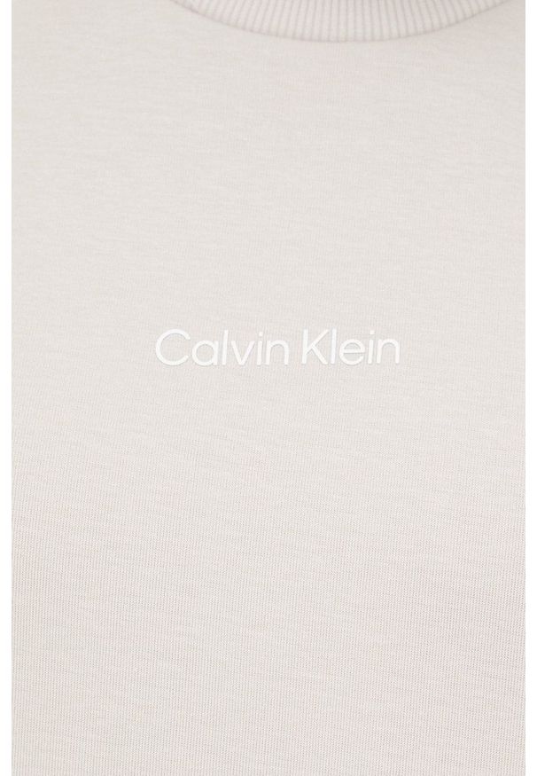 Calvin Klein bluza kolor beżowy. Kolor: beżowy. Długość rękawa: długi rękaw. Długość: długie. Wzór: nadruk
