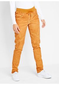 Spodnie bojówki z efektem "used" bonprix miodowy. Kolor: pomarańczowy #6