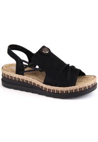 Komfortowe sandały damskie na koturnie wsuwane czarne Rieker V7972-00. Zapięcie: bez zapięcia. Kolor: czarny. Obcas: na koturnie