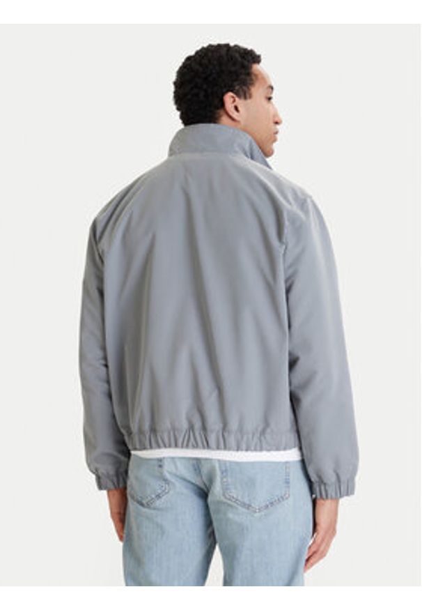 Tommy Jeans Kurtka przejściowa Essential DM0DM22720 Szary Regular Fit. Kolor: szary. Materiał: syntetyk