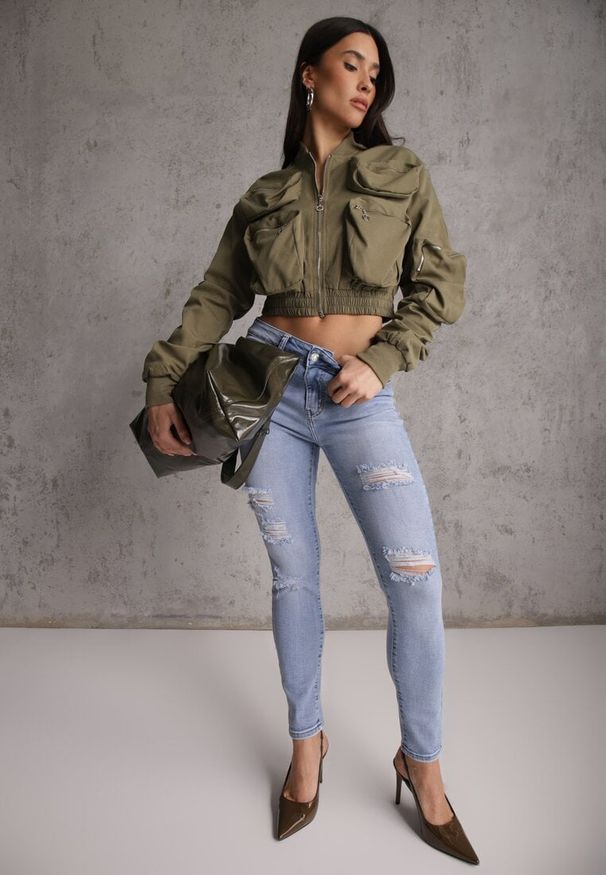 Renee - Niebieskie Jeansy Slim z Bawełny Ozdobione Przetarciami Vikiania. Okazja: na co dzień. Kolor: niebieski. Wzór: aplikacja. Styl: casual