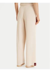 Guess Spodnie dresowe V6GB06 Z0651 Beżowy Wide Leg. Kolor: beżowy. Materiał: syntetyk #4