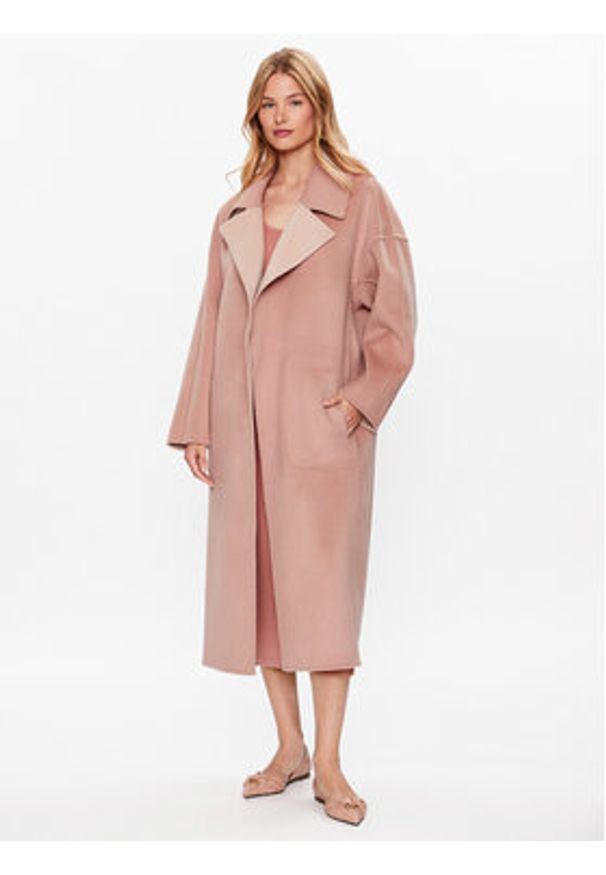 Calvin Klein Płaszcz wełniany K20K205855 Różowy Regular Fit. Kolor: różowy. Materiał: wełna