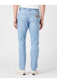 Wrangler - WRANGLER TEXAS TAPER MĘSKIE SPODNIE JEANSOWE LOVESICK W12TY728Q 112319945. Okazja: na spotkanie biznesowe. Styl: biznesowy, elegancki
