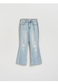 Reserved - Jeansy bootcut z przetarciami - niebieski. Kolor: niebieski #1
