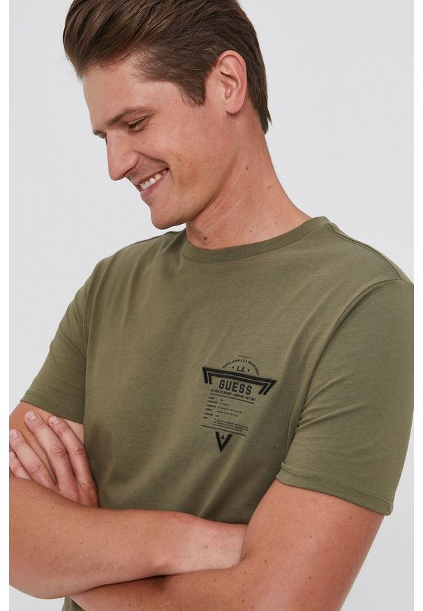 Guess - T-shirt bawełniany. Okazja: na co dzień. Kolor: zielony. Materiał: bawełna. Wzór: nadruk. Styl: casual