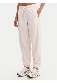 Reebok Spodnie dresowe Galina RK25518CCW Różowy Relaxed Fit. Kolor: różowy. Materiał: syntetyk #1