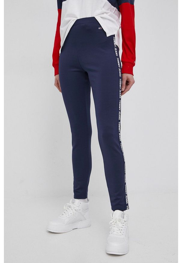 Tommy Jeans legginsy damskie kolor granatowy z aplikacją. Kolor: niebieski. Materiał: dzianina, poliester. Wzór: aplikacja