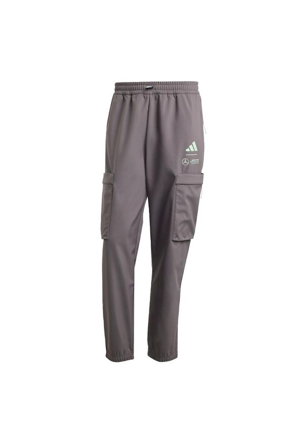 Adidas - Spodnie Mercedes - Amg Petronas Formula One Team Premium Woven. Kolor: fioletowy, zielony, wielokolorowy. Materiał: tkanina, materiał