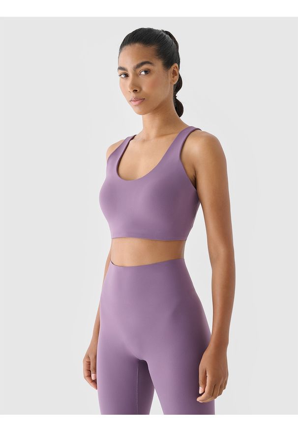4f - 4F Biustonosz treningowy ze średnim wsparciem - fioletowy M. Kolor: fioletowy. Materiał: dzianina, elastan, włókno, syntetyk, materiał, guma. Wzór: gładki, jednolity, ze splotem. Sport: fitness, bieganie, kolarstwo